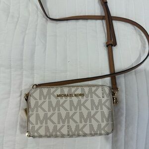 Michael Kors Tan and White Crossbody Bag with Monogram Pattern